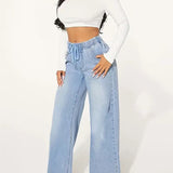 High waist wide leg jeans in light blue displayed on model, featuring a drawstring for adjustable fit and modern street style.